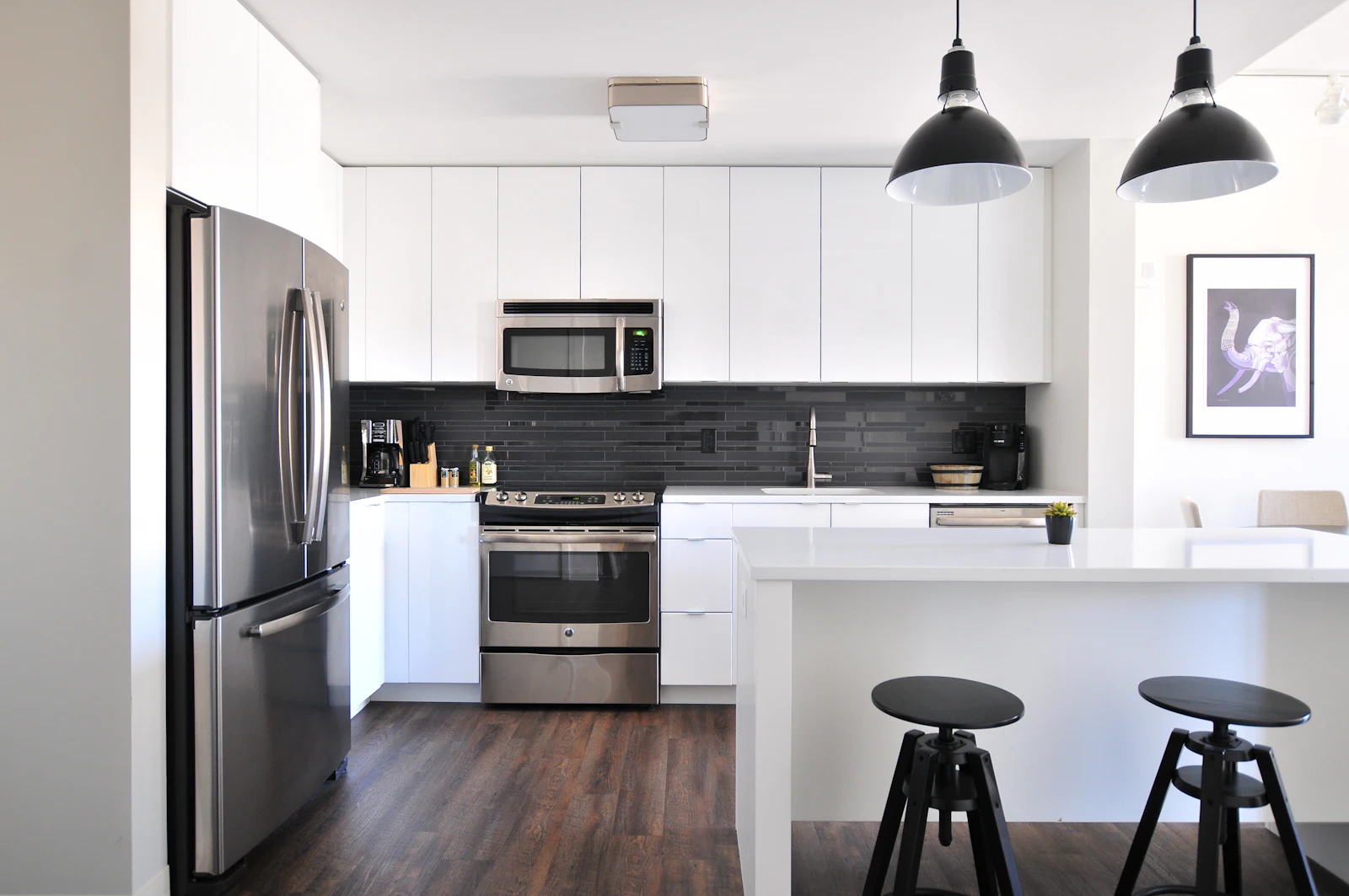 A clean new kitchen with wiped cabinets and counters